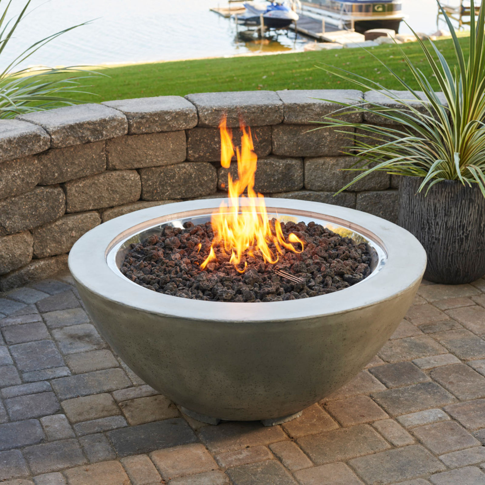 Enhance your outdoor space with the Cove 42" Round Gas Fire Pit Bowl. Available in Natural Grey, Midnight Mist, and White. Experience warmth and style today.