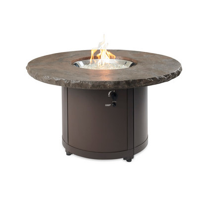 "Discover the Beacon Fire Pit Table - modern elegance with propane/natural gas. Marbleized Noche Supercast™ top on a sturdy steel base. Chat-height design for warmth and relaxation. UL-listed 20" Crystal Fire® Plus Burner. Elevate your outdoor space!"