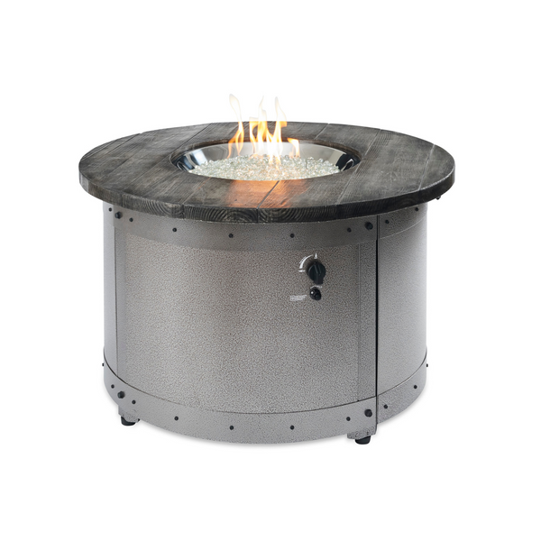 Craft a unique outdoor space with the Edison Gas Fire Pit Table. Industrial and modern aesthetics combine in this propane and natural gas compatible table. Powder-coated steel base with a Weathered Grey Barnwood Supercast™ concrete top. Experience mesmerizing warmth and style with the UL listed Crystal Fire® Plus burner.