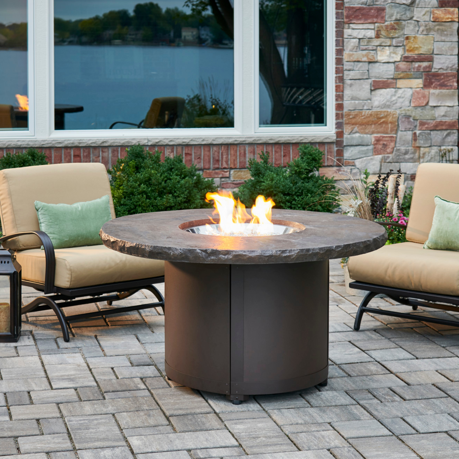 "Discover the Beacon Fire Pit Table - modern elegance with propane/natural gas. Marbleized Noche Supercast™ top on a sturdy steel base. Chat-height design for warmth and relaxation. UL-listed 20" Crystal Fire® Plus Burner. Elevate your outdoor space!"