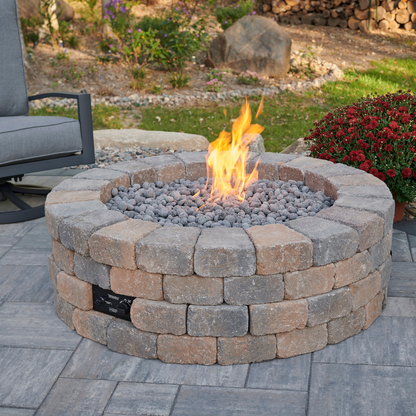 Transform your backyard into a cozy retreat with the Bronson Block Round Gas Fire Pit Kit. Enjoy the perfect blend of warmth, ambiance, and modern design.