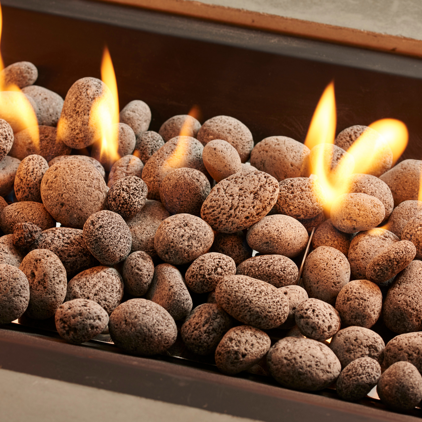 Complete your gas fire pit table or fireplace with beautiful Authentic tumbled lava Rocks, and provide an elegant finish, great for both modern and traditional styles.