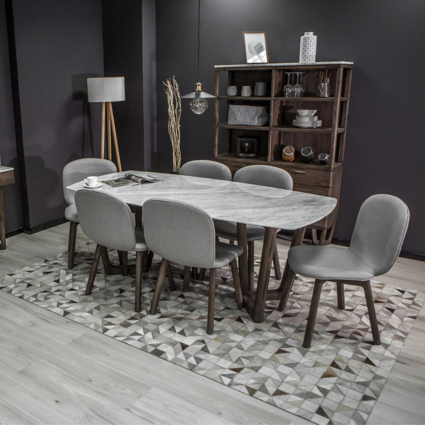 "Introduce elegance and functionality with the Aura Dining Table, designed for intimate gatherings. Crafted with solid wood, it embodies durability and sophistication. Italian Carrara Marble top, sturdy acacia frame, and unique V-shaped base. Exquisite table that comfortably seats six, rekindling the joy of dining at home."