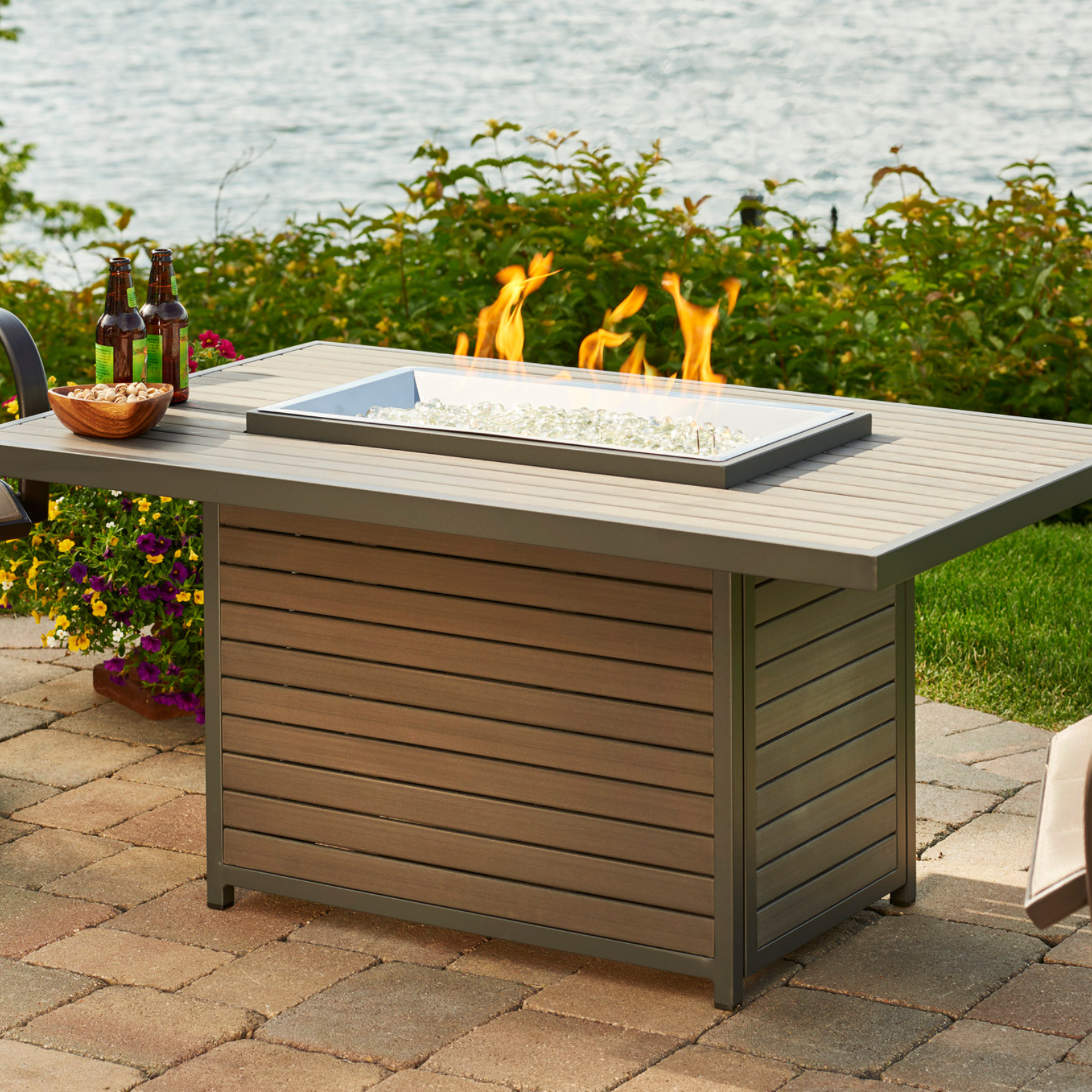 Enhance your outdoor gatherings with the Brooks Rectangular Gas Fire Pit Table. Enjoy warmth, style, and convenience in one stunning centerpiece for your patio or backyard.