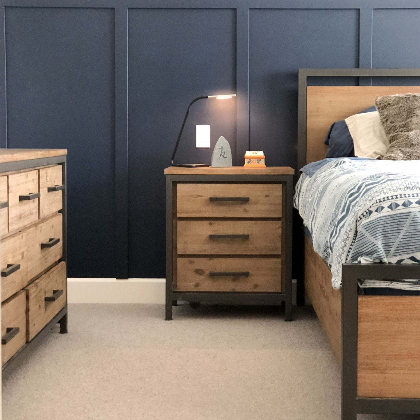 "Experience functionality and style with the Irondale Nightstand. Ample storage space for an organized room. Robust solid acacia wood construction with a grey iron frame for an industrial vibe. Rustic elements elevate your master bedroom. Let the Irondale Nightstand be a testament to your unique style."