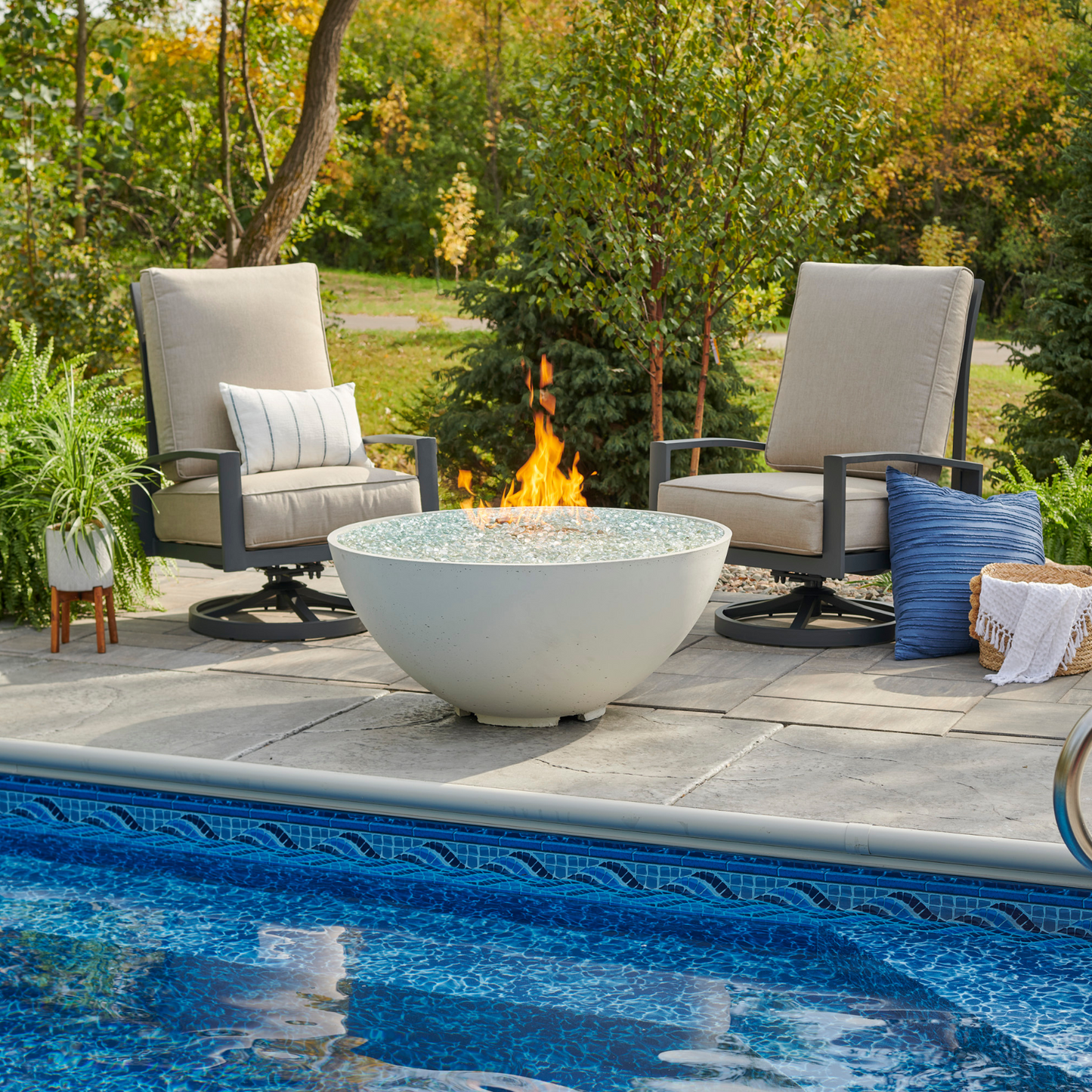 Enhance your outdoor space with the Cove 42" Round Gas Fire Pit Bowl. Available in Natural Grey, Midnight Mist, and White. Experience warmth and style today.