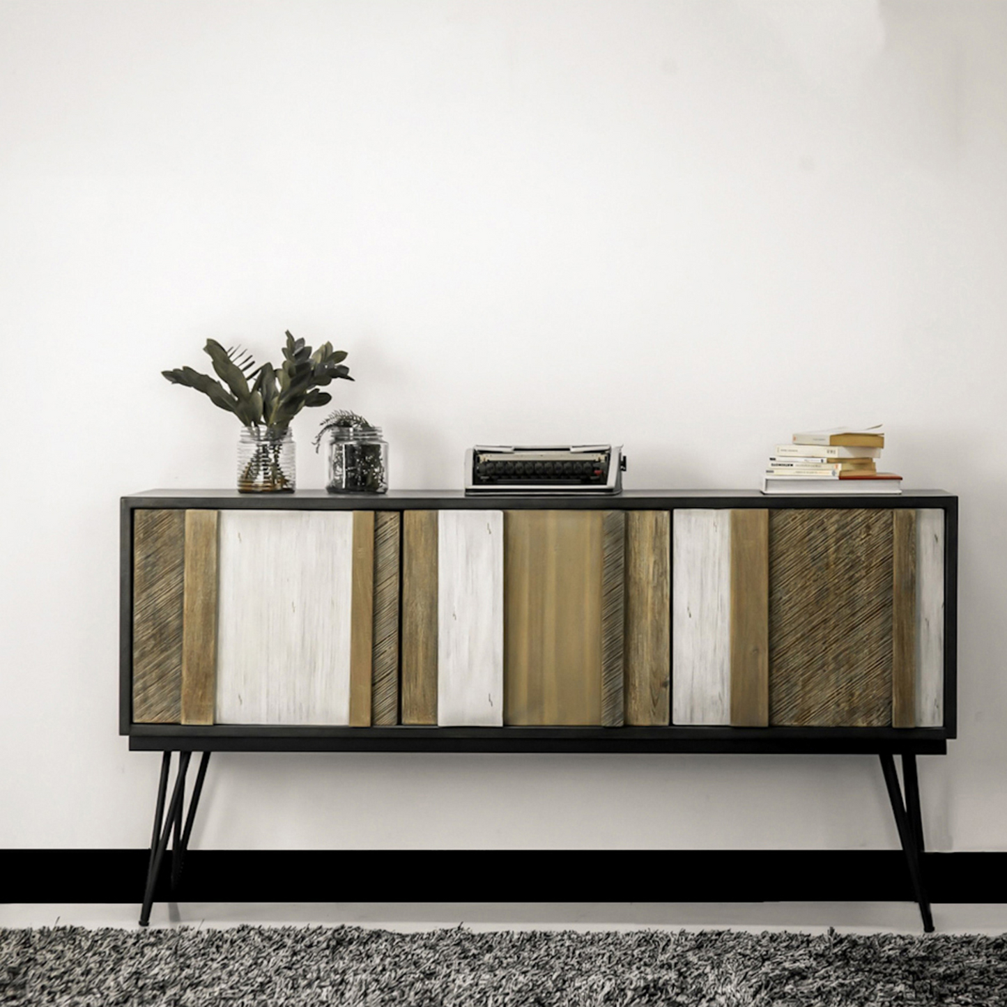 Experience the seamless blend of functionality and design with the Metro Noir Havana Sideboard. Modern farmhouse aesthetic. Crafted from solid acacia wood and iron frame. Ample storage space. Expansive surface for displaying decor or serving essentials. Elevate your space with this conversation-starting piece.