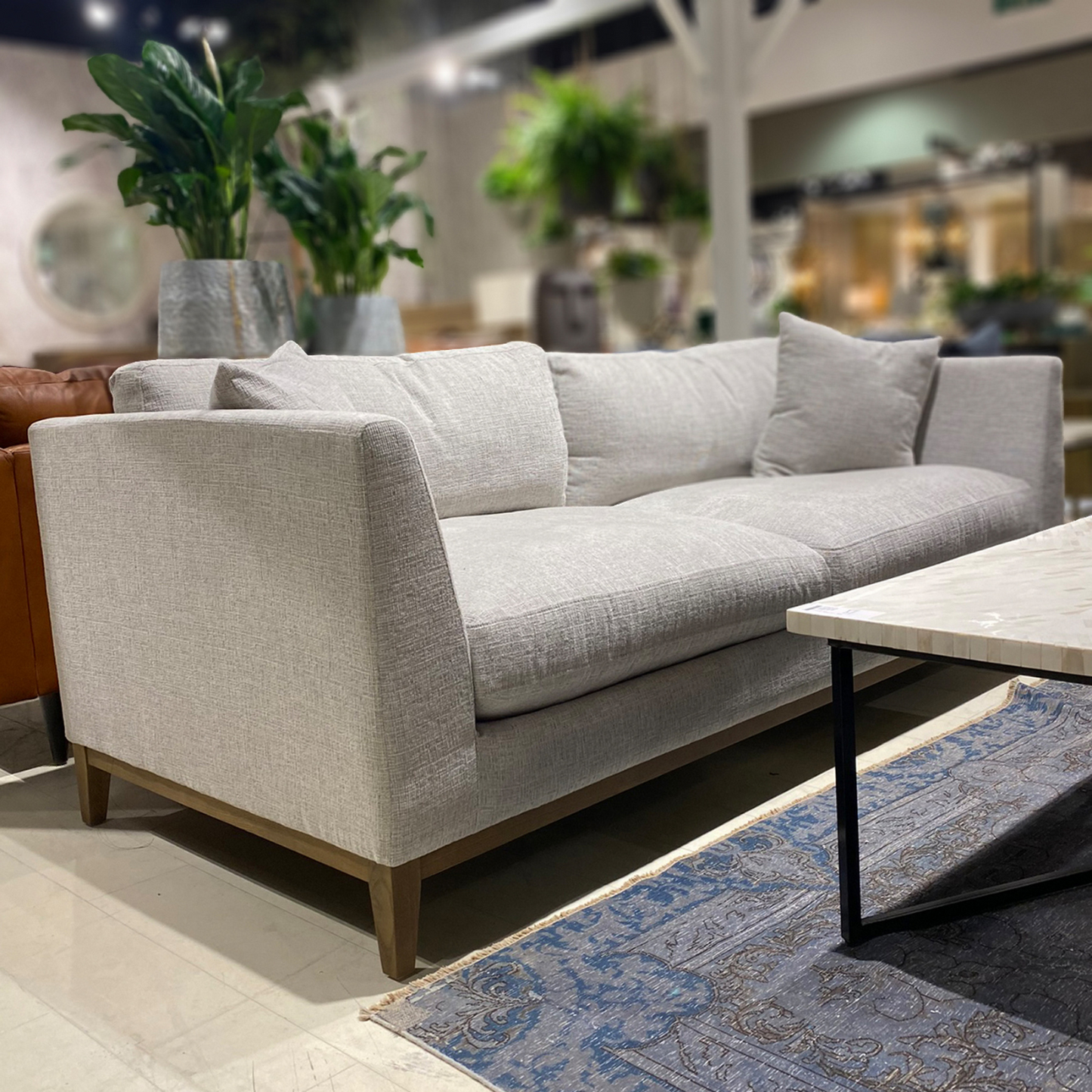 Experience refined luxury with the Harmony Sofa. Crafted from oak, pine, and plywood, this sofa offers a seamless fusion of modern design and comfort. Plush foam cushions and feather-filled pillows provide supreme comfort, while the woven tweed neutral upholstery adds an elegant touch to your living space.